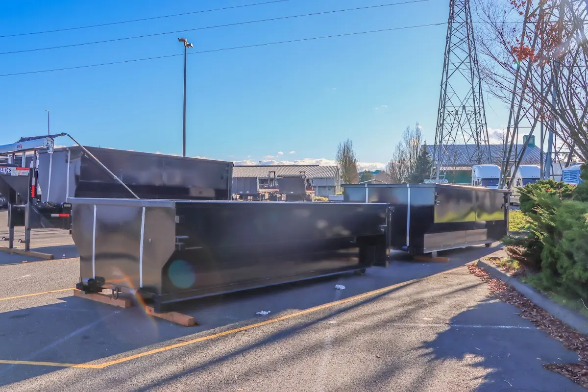 Roll-off dumpster ready for waste disposal at job site for 12 Yard Dumpster Rental in Pepperell